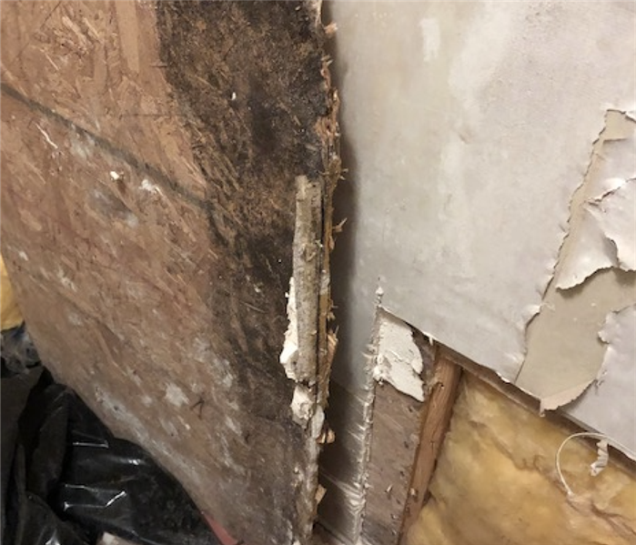 commercial water damage to a wall