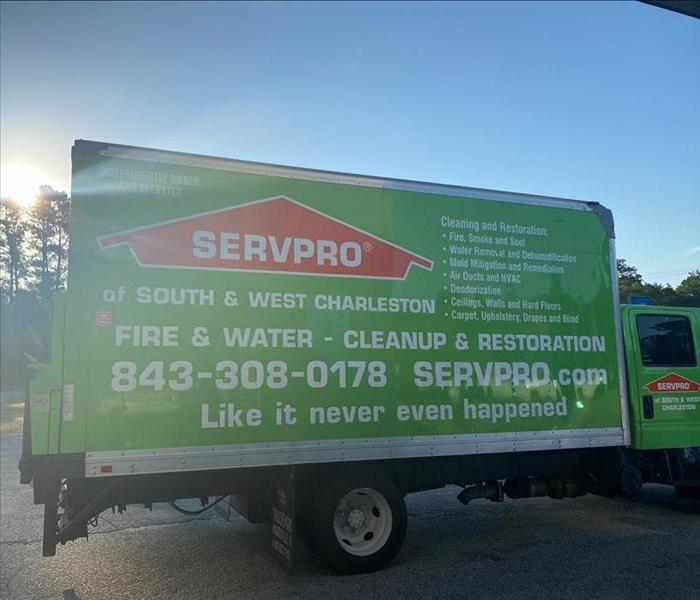 Green SERVPRO truck.